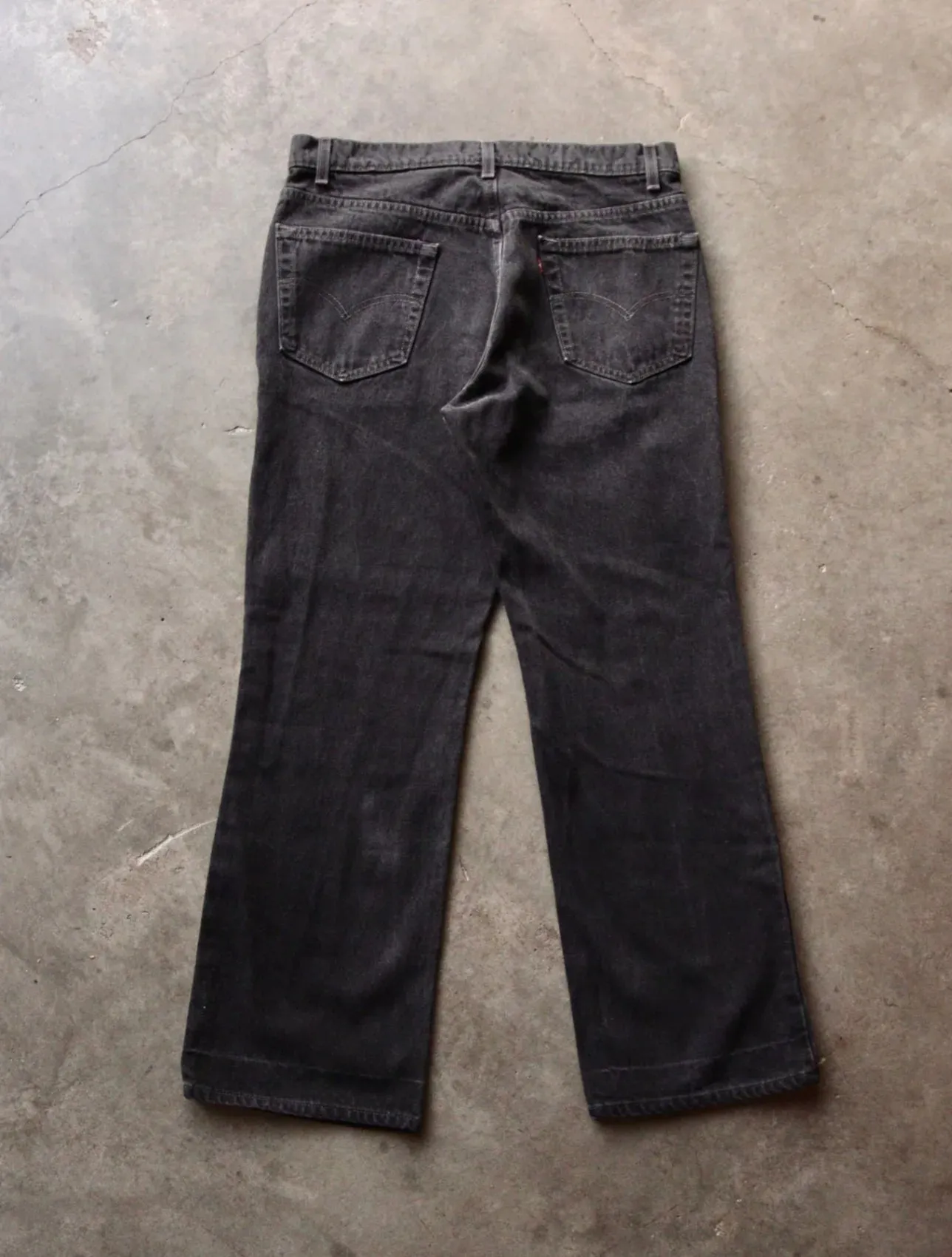 1990S LEVI'S BLACK FLARED DENIM PANTS