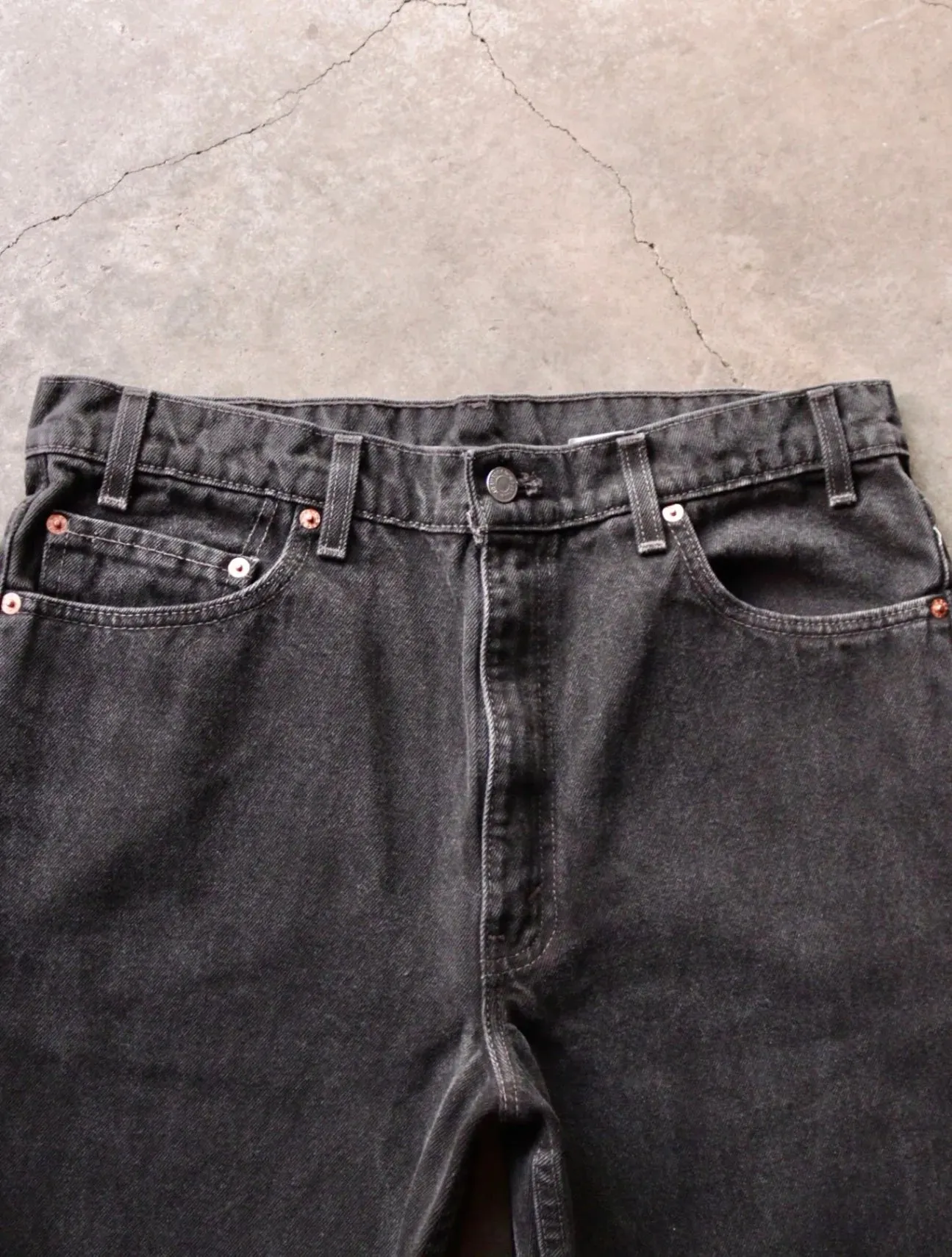 1990S LEVI'S BLACK FLARED DENIM PANTS