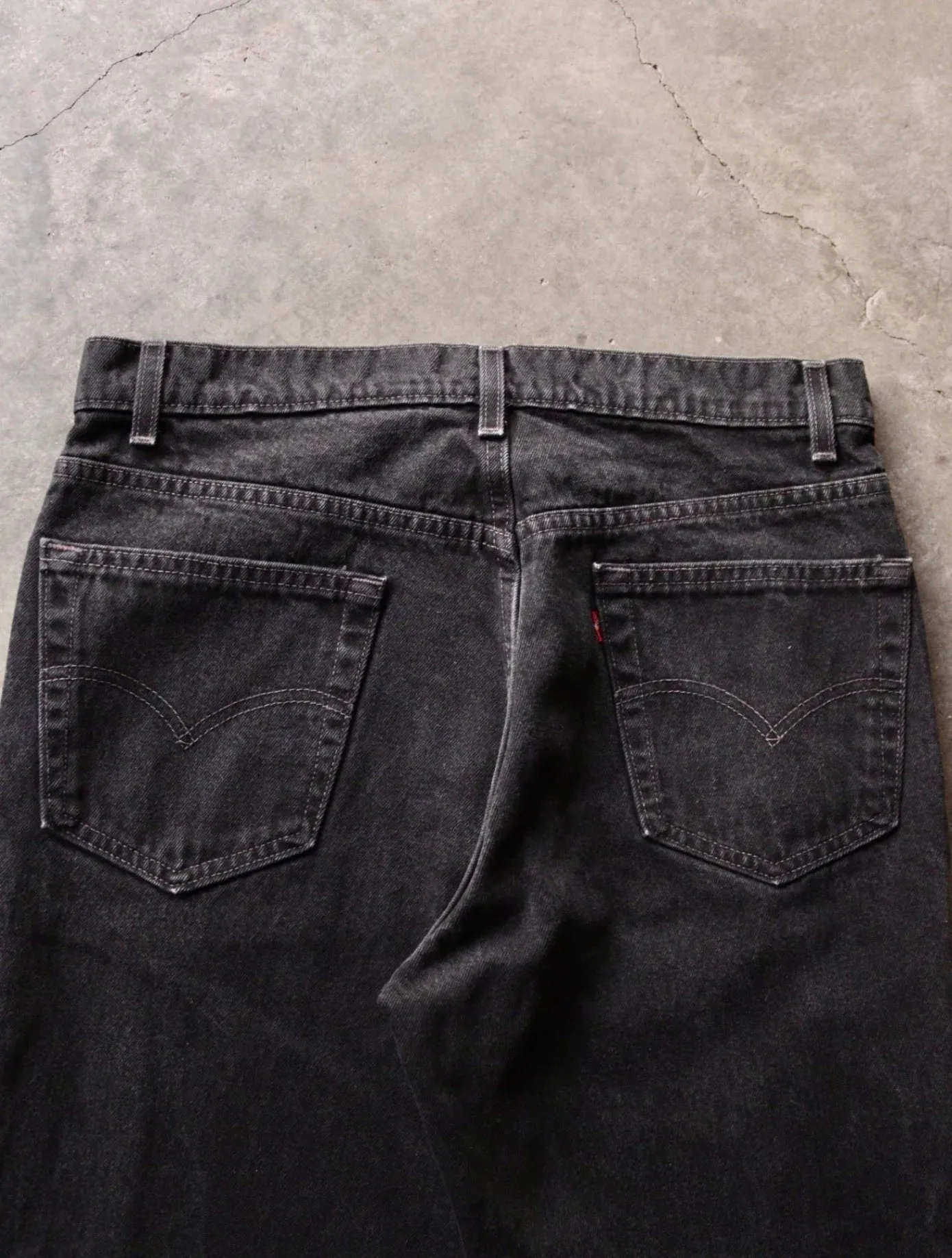 1990S LEVI'S BLACK FLARED DENIM PANTS